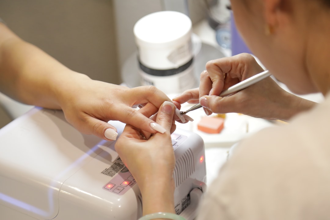 A gel manicure being finished